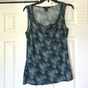 Green, white and black pattern tank top .